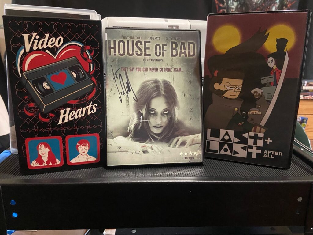 DVDs and VHS for "Video Hearts," "House of Bad," and "Last Last After All