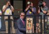These 10 Pittsburgh Legends Reveal Their Star on the Pittsburgh Walk of Fame for the 2026 Induction Man in suit holds Pittsburgh Walk of Fame star, media present.