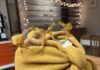 Shop of the Week: HeidiOptics Makes a Case for Eyewear as Personal Style HeidiOptics round eyeglasses on a mustard yellow knit hat display
