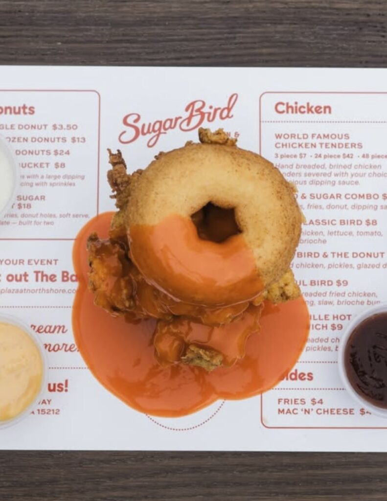 SugarBird donut chicken sandwich with dipping sauces, a new Pittsburgh restaurant item.